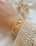 Perlenarmband aus Dorika-Perlen & goldenen Talern