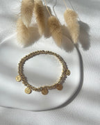 Perlenarmband aus Dorika-Perlen & goldenen Talern