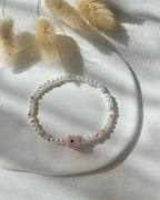 Perlenarmband in Weiß und Rosa + Nazarwürfel