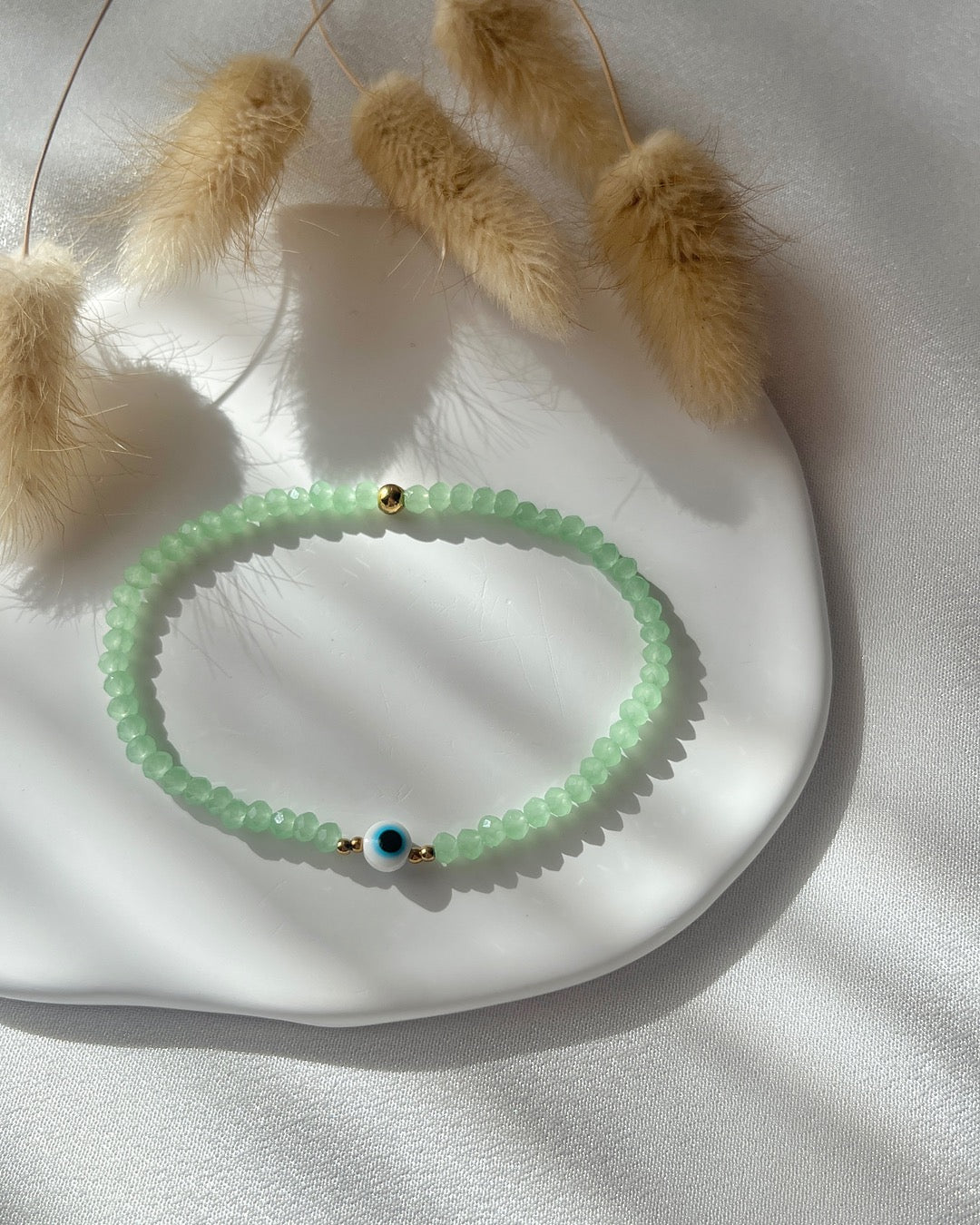 Perlenarmband in Grün & Nazar