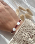 Perlenarmband mit runden Muschelperlen & roten Perlen
