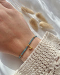 Perlenarmband aus grünen Miyuki-Perlen & Schmetterling