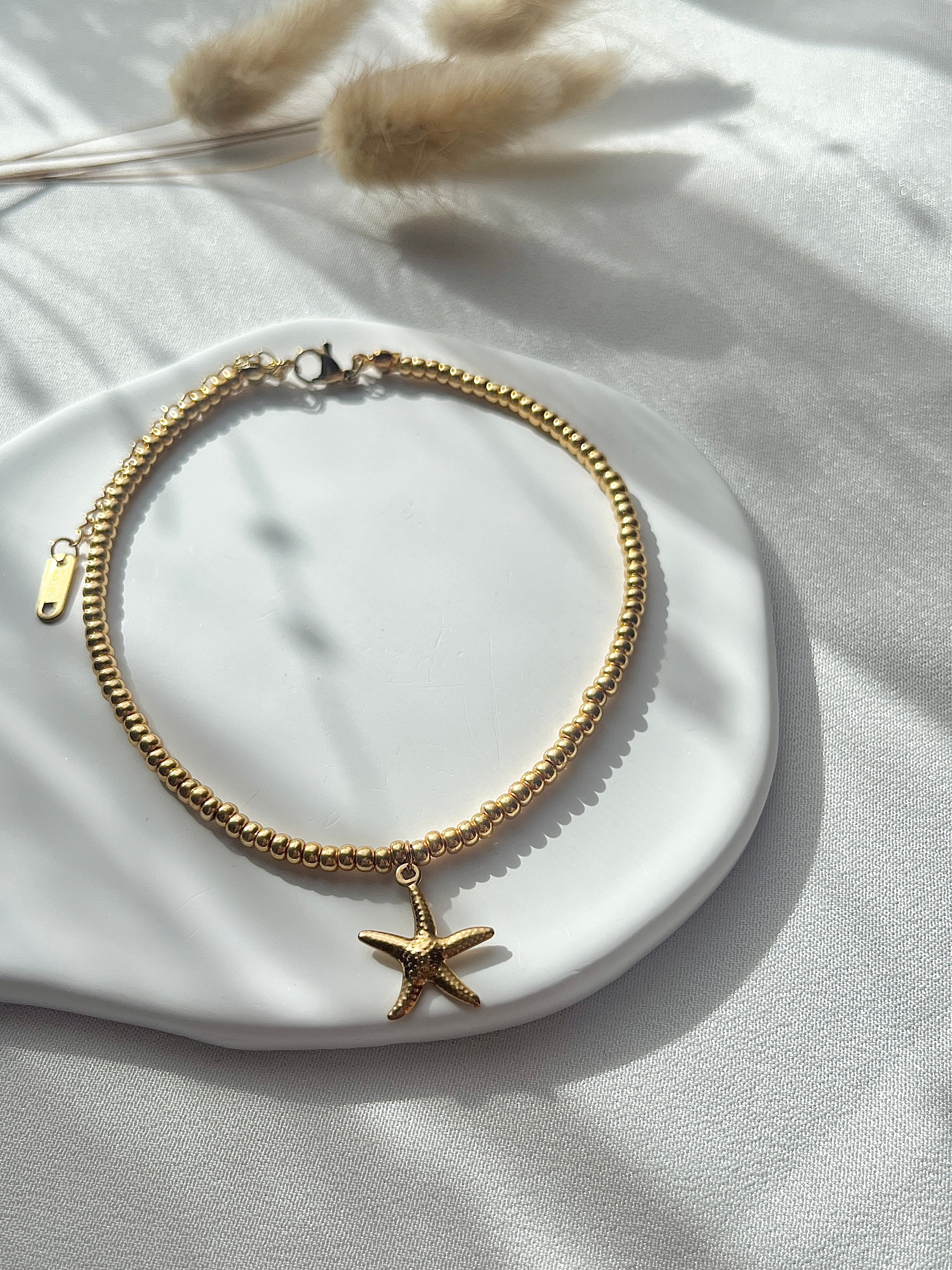 Fußkette aus goldenen Perlen & Seestern-Anhänger