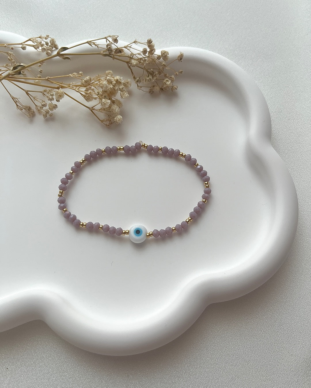 Perlenarmband in Lila & Nazarperle