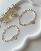 Perlenarmband in Weiß/Rosa & Herz-Charm