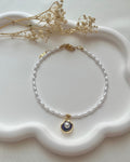 Fußkette in Weiß & Lilanem Muschel-Charm