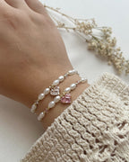 Perlenarmband in Weiß/Rosa & Herz-Charm