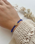 Perlenarmband in Dunkelblau & Blume