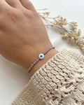 Perlenarmband in Lila & Nazarperle