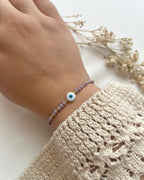 Perlenarmband in Lila & Nazarperle