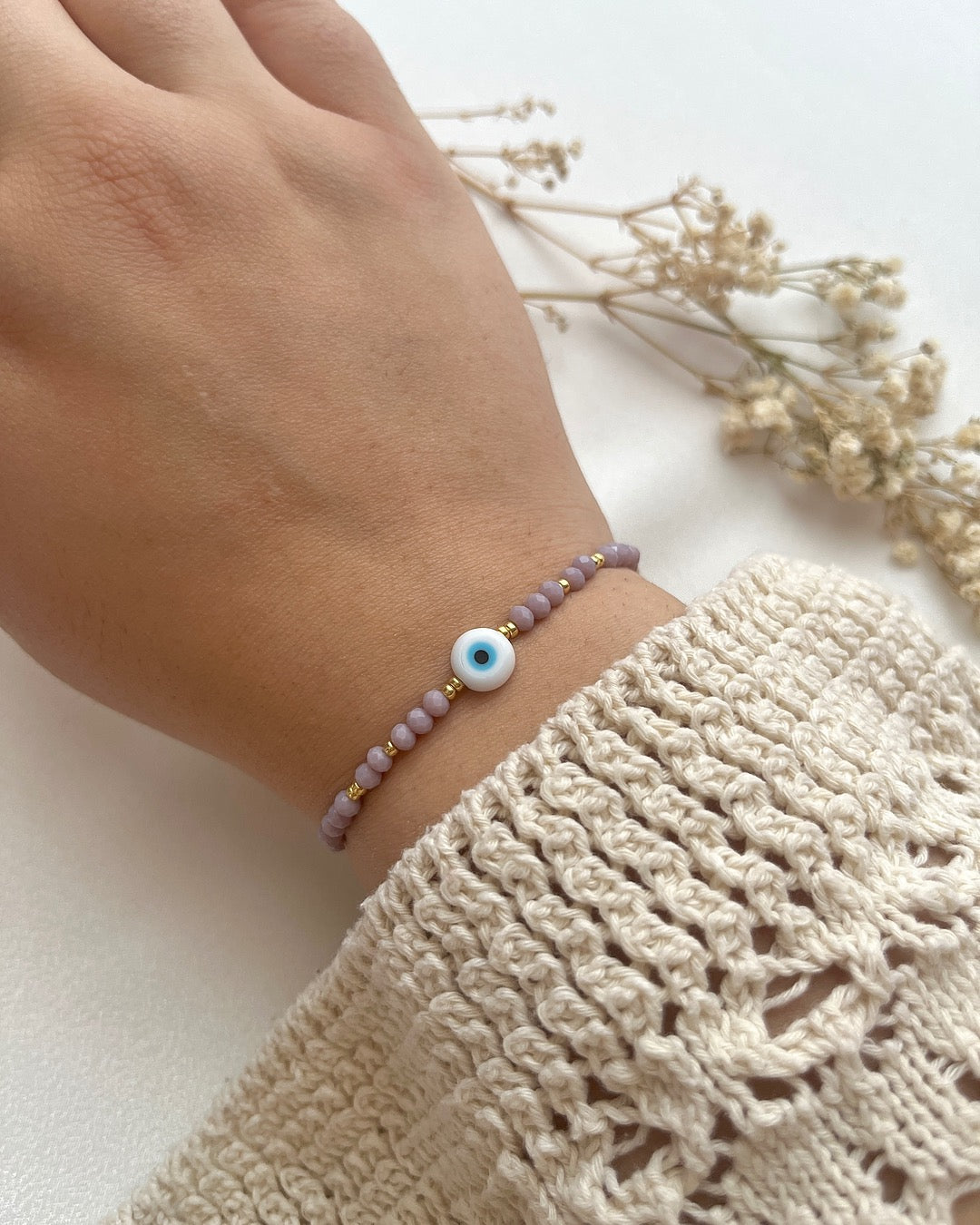 Perlenarmband in Lila & Nazarperle