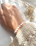 Perlenarmband aus Perlmutt-Herzen