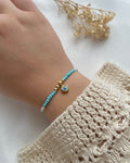 Perlenarmband in Hellblau & Nazar-Herz-Charm