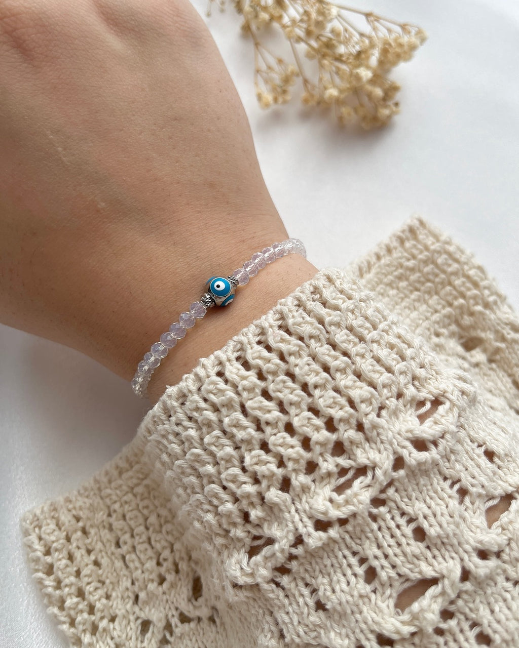 Perlenarmband in durchsichtig Weiß & Nazarkugel