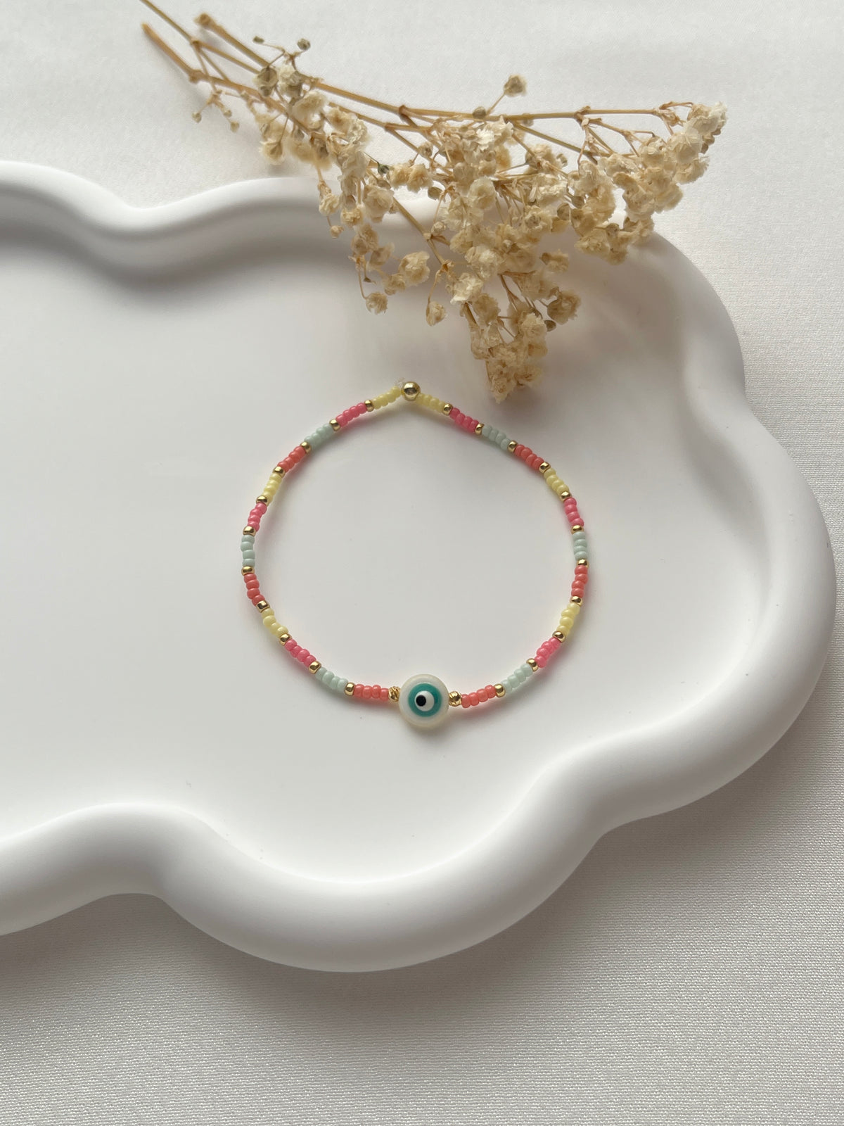 Perlenarmband in Bunt mit einem Nazar-Perlmutt