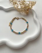 Perlenarmband aus Dorika Perlen und Nazarperlen
