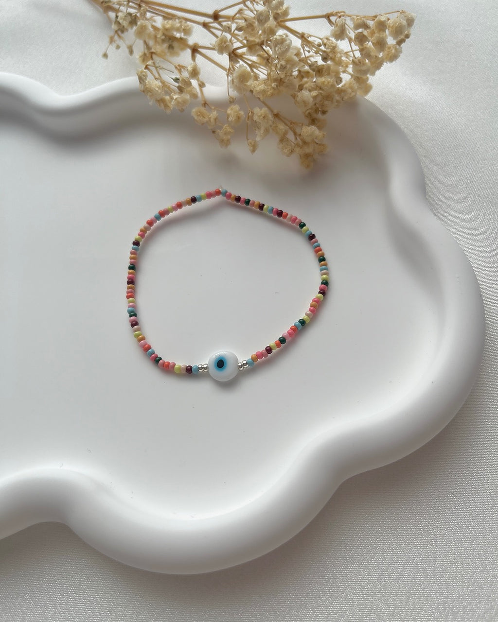 Perlenarmband in Bunt mit Nazarperle & silbernen Details