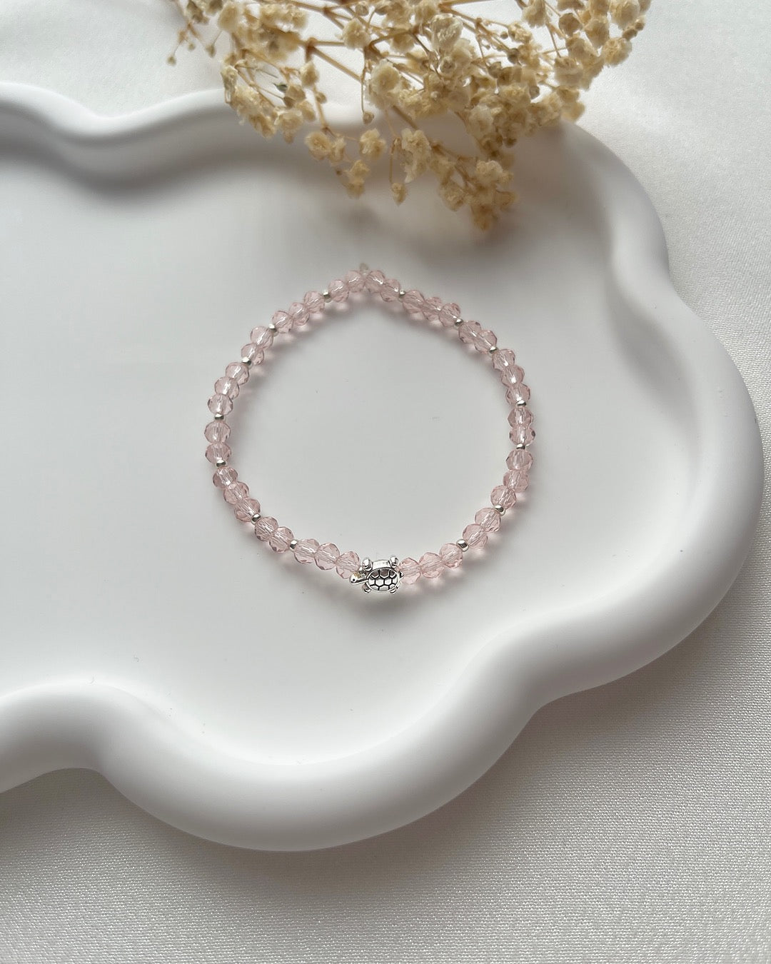 Perlenarmband in Rosa & silberner Schildkröte
